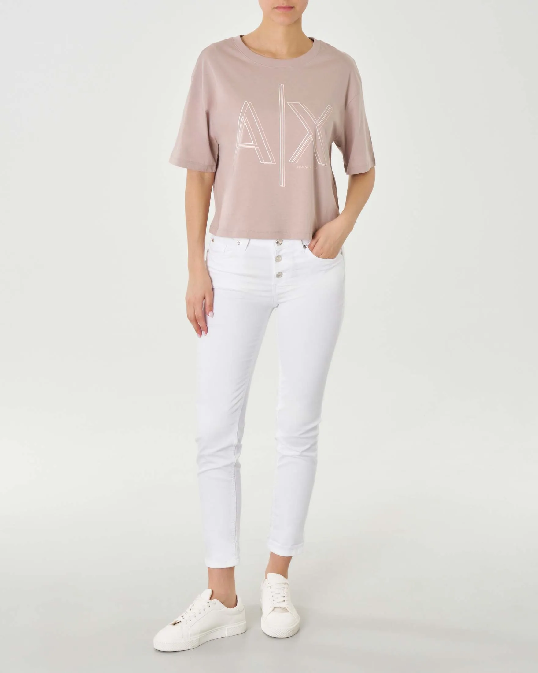 White slim ankle-length stretch cotton pants with visible button closure.